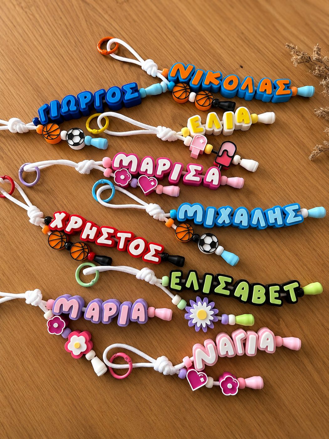 Personalised name keychains with charms and beads – basketball, football, hearts and flowers – custom gift Cyprus